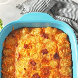 overhead of tater tot casserole in blue dish