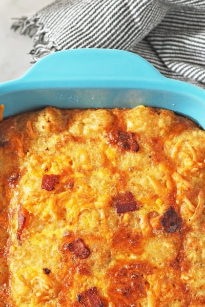 overhead of tater tot casserole in blue dish