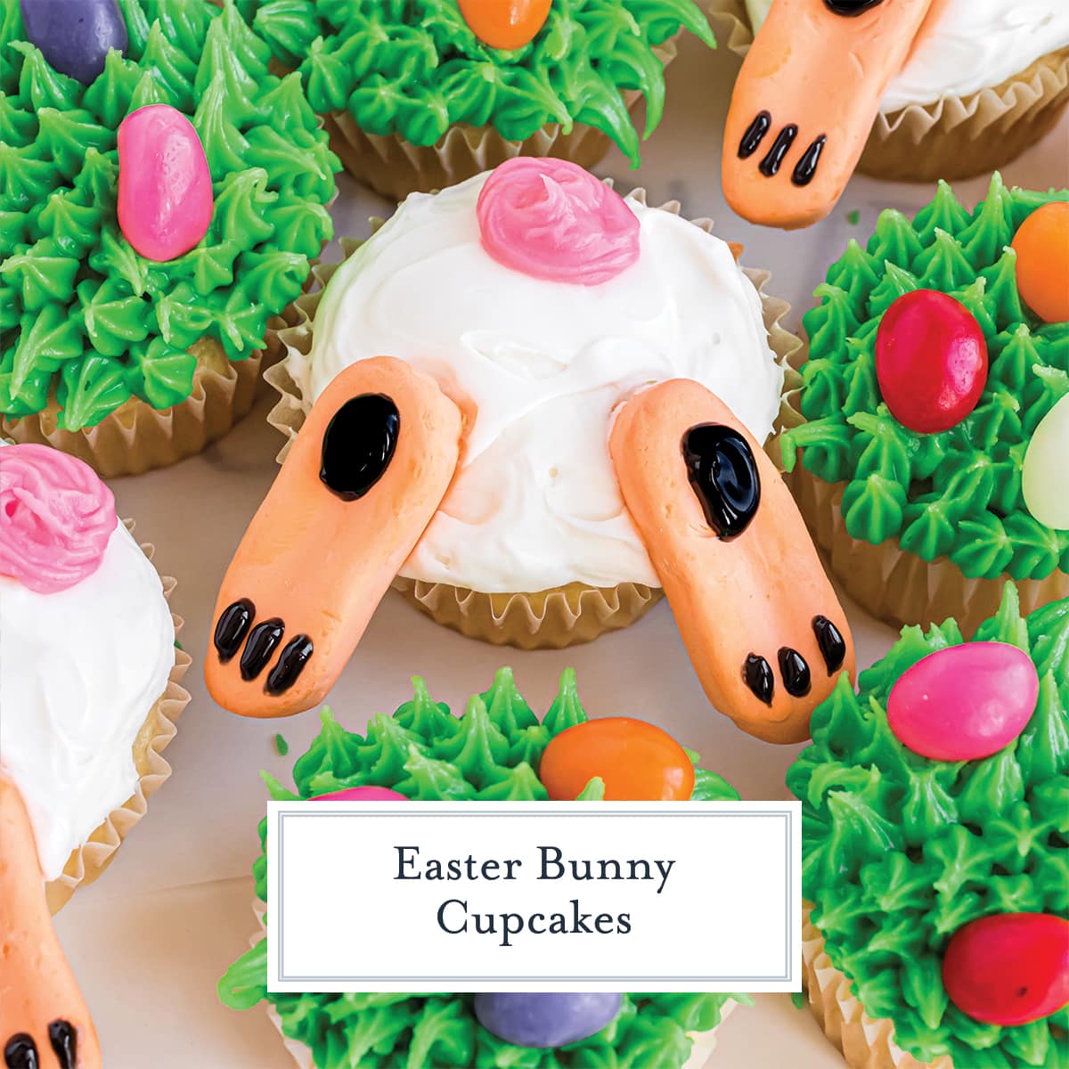 close up of bunny butt cupcake in grass with jelly beans 