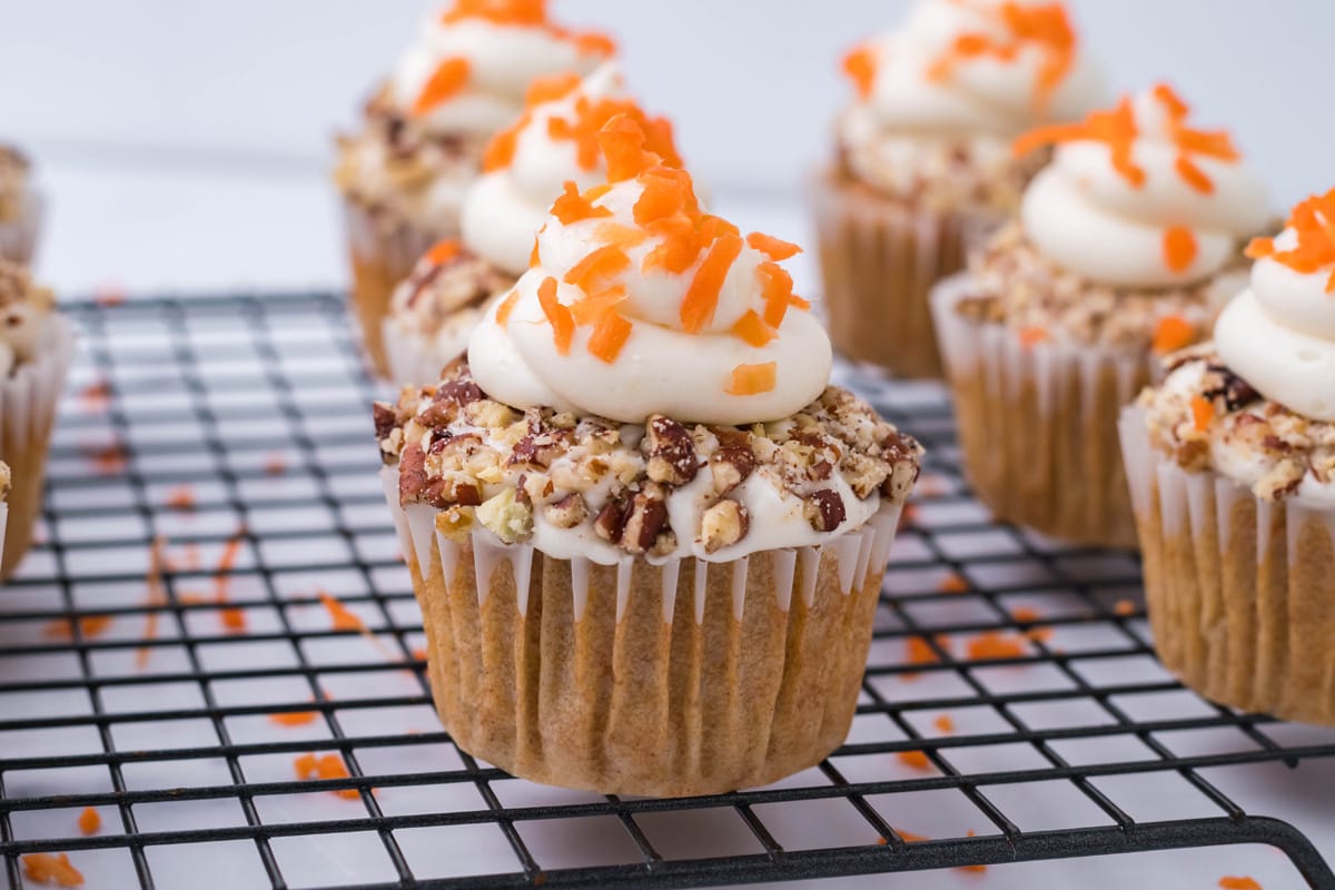 carrot cake cupcakes on a wire rack 