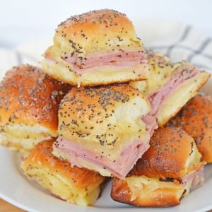 plate of buttery hawaiian ham and cheese sliders