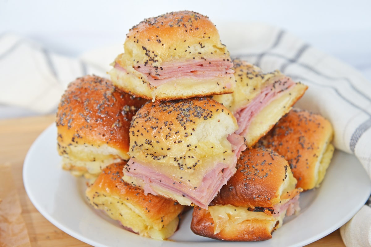 plate of buttery hawaiian ham and cheese sliders