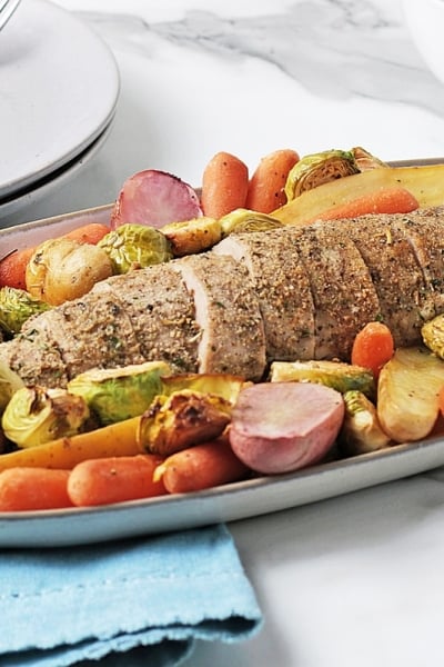 sliced pork tenderloin with roasted veggies