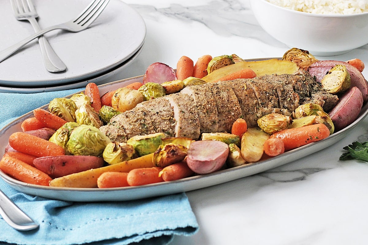 sliced pork tenderloin with roasted veggies