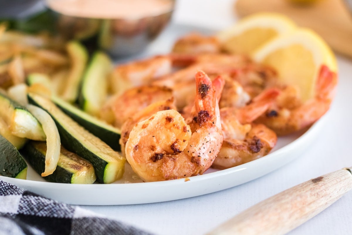 close up of browned shrimp on a plate