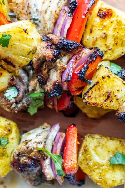 close up of jerk chicken and vegetables