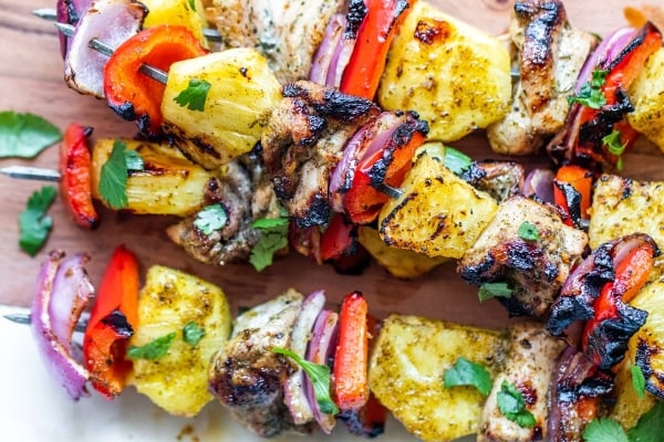 close up of jerk chicken and vegetables