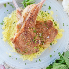 plated lamb chops over couscous