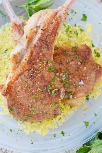 plated lamb chops over couscous