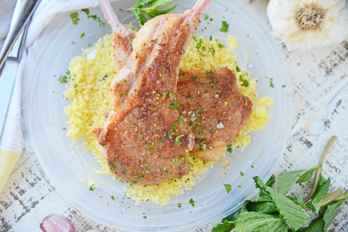 plated lamb chops over couscous