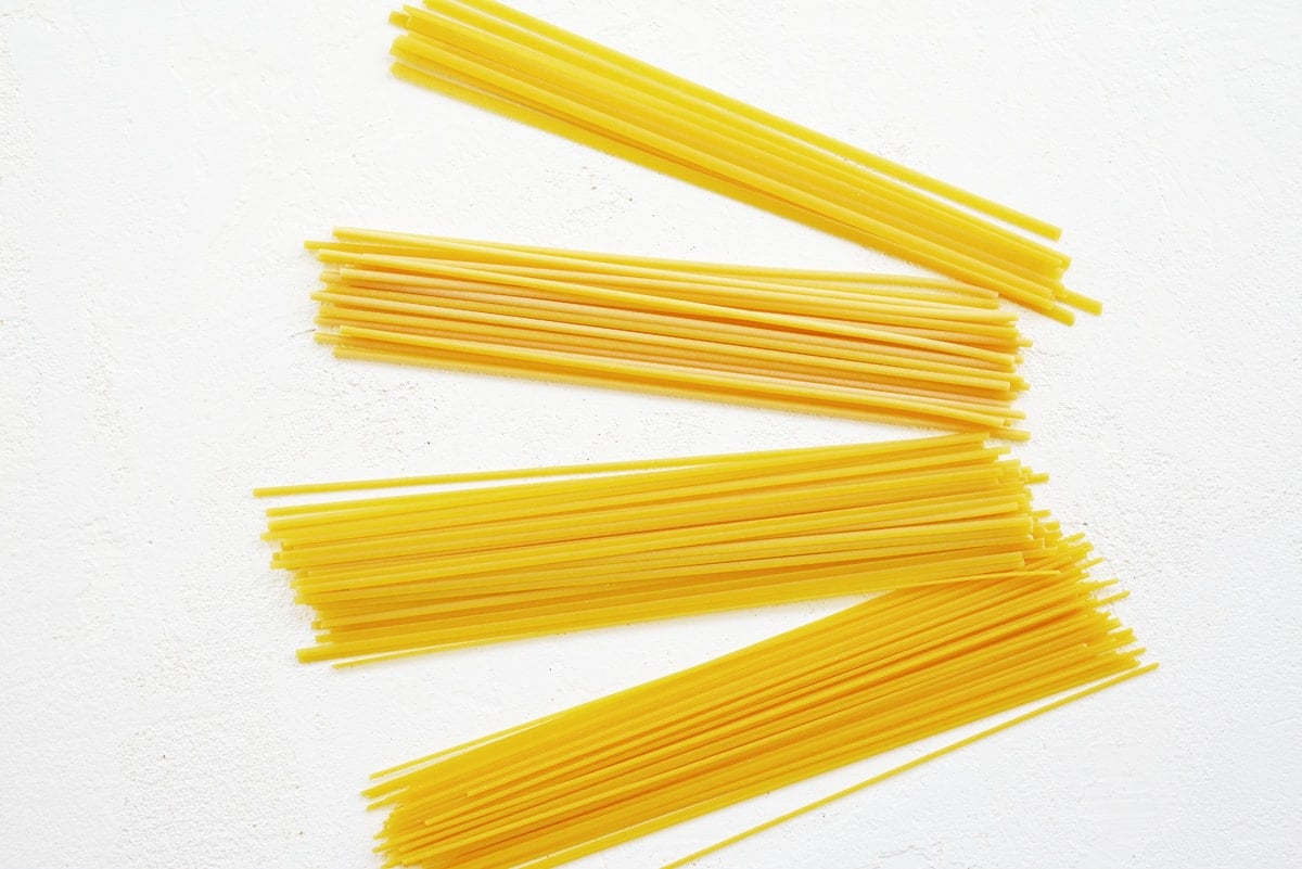 types of pasta: linguine, spaghetti, fettuccine and bucatini  