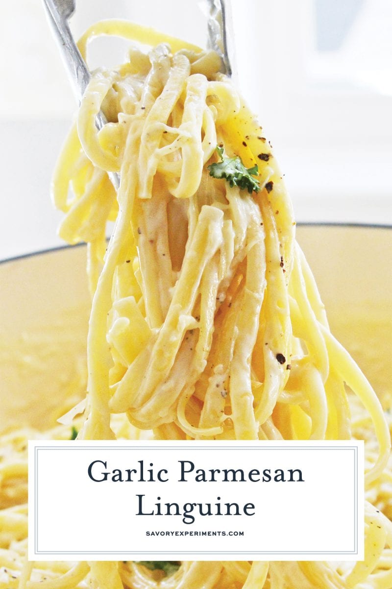 tongs tossing a parmesan garlic linguine 