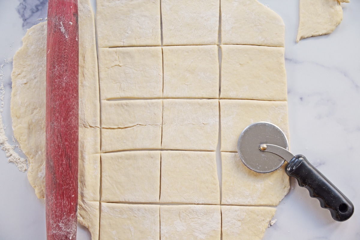 cutting dough into squares 