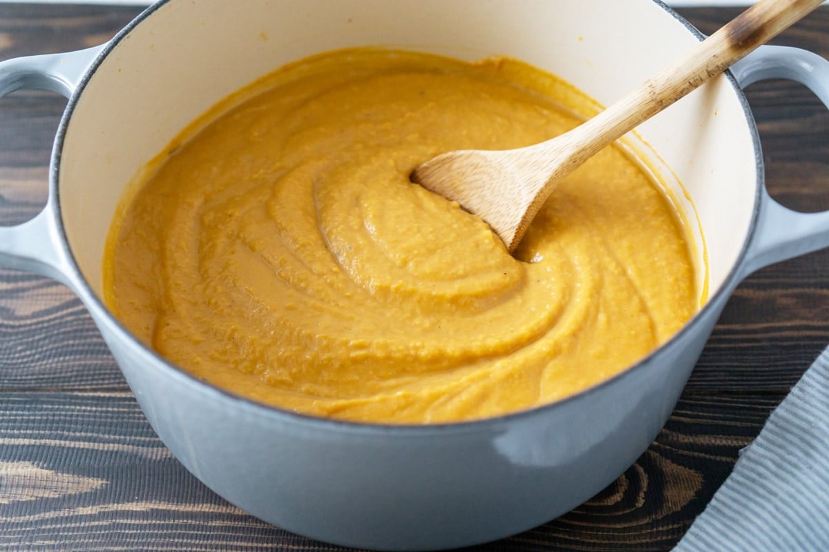 butternut squash soup in a blue dutch oven  