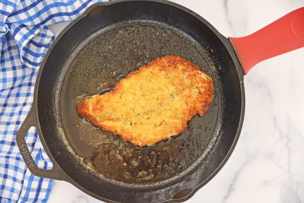 frying a chicken cutlet