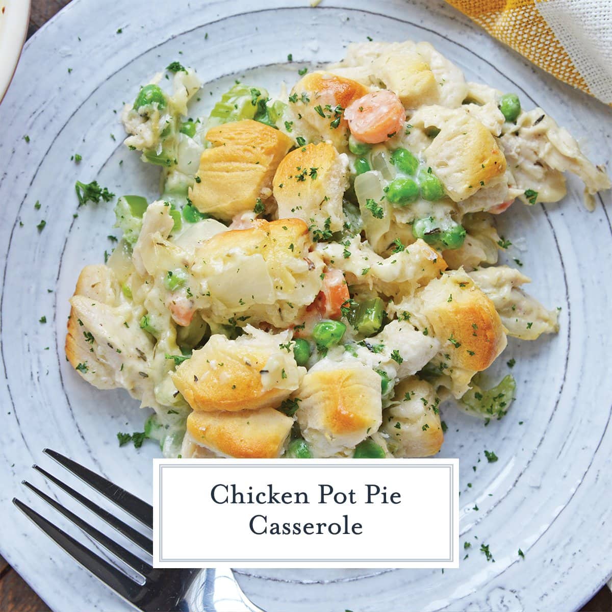 overhead close up of chicken pot pie casserole on a white plate 