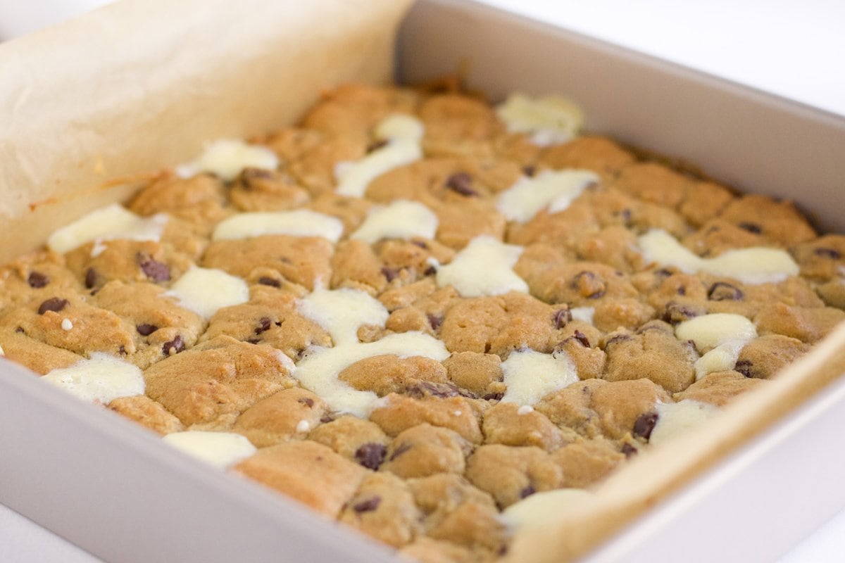 overhead of cheesecake bars in baking pan 