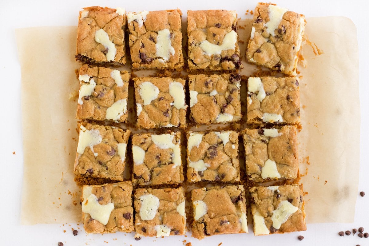chocolate chip cookie cheesecake bars cut into 16 pieces
