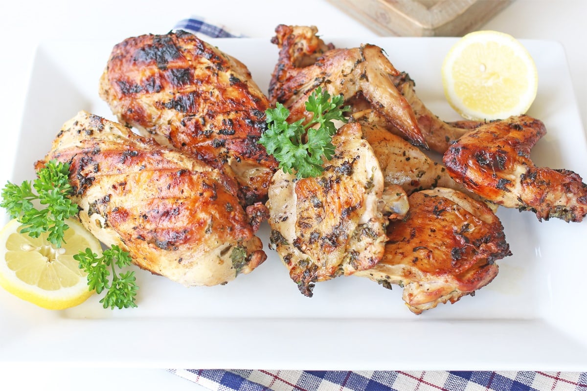 platter of grilled chicken pieces 