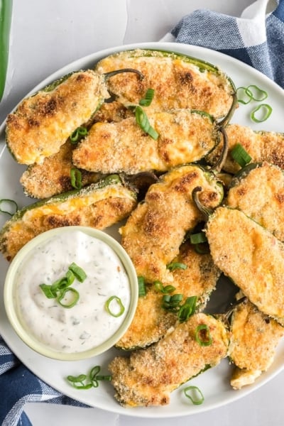 overhead of jalapeno poppers with white dip