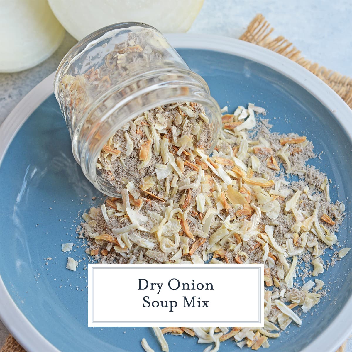 close up of dry onion soup mix pouring out
