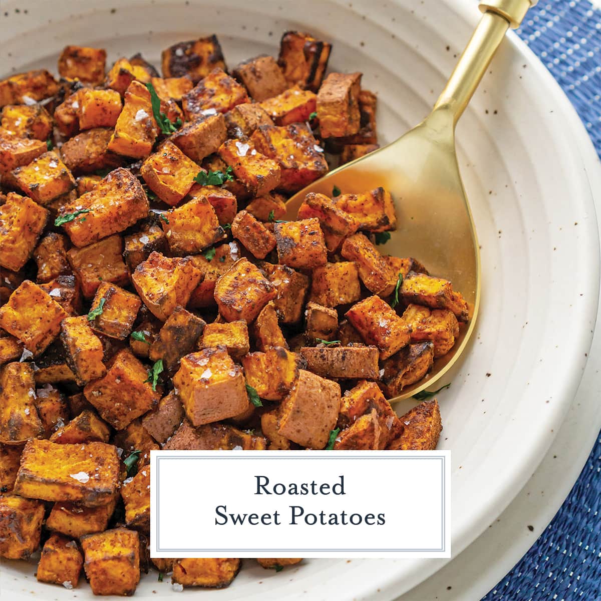 angled shot of serving spoon in bowl of sweet potato cubes with text overlay