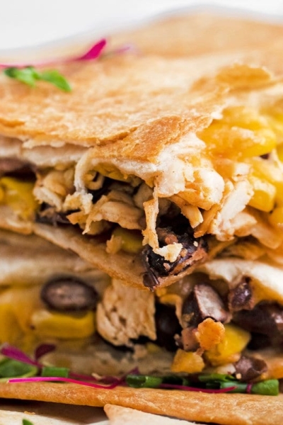 straight on shot of stack of sheet pan quesadillas