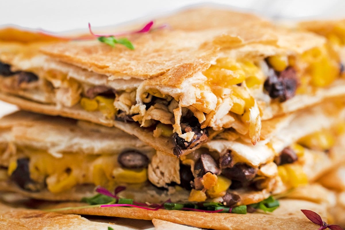 close up side view of chicken quesadilla fillings 