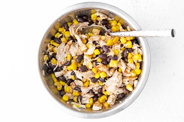 corn, beans and chicken in a bowl