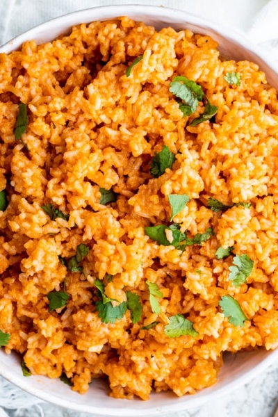 overhead of spanish rice in a white serving bowl