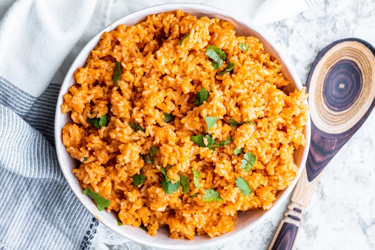 overhead of spanish rice in a white serving bowl