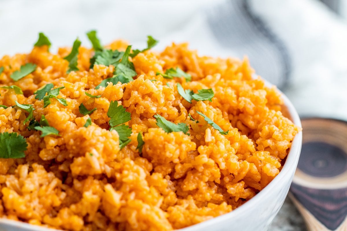 close up angle of spanish rice in a white bowl 