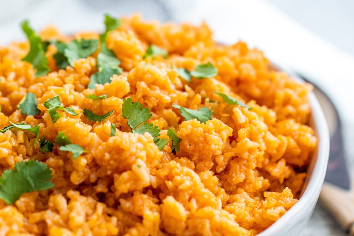 rice pilaf in a white serving bowl 