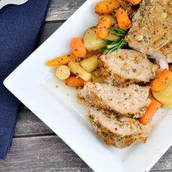 overhead shot of pork tenderloin with root vegetables