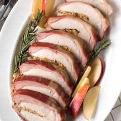 sliced pork roast on a platter