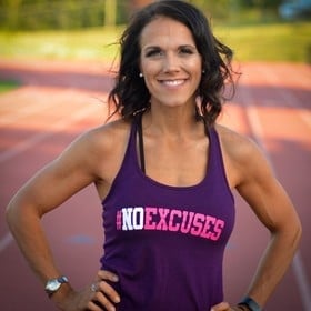 woman in purple tank top with hands on hips