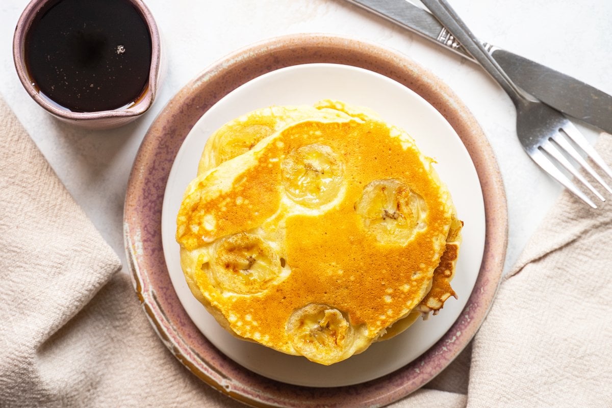 overhead of banana slices in pancakes 