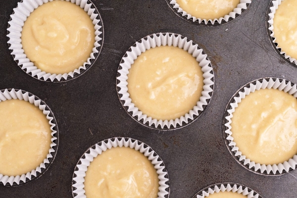 cake batter in muffin tin