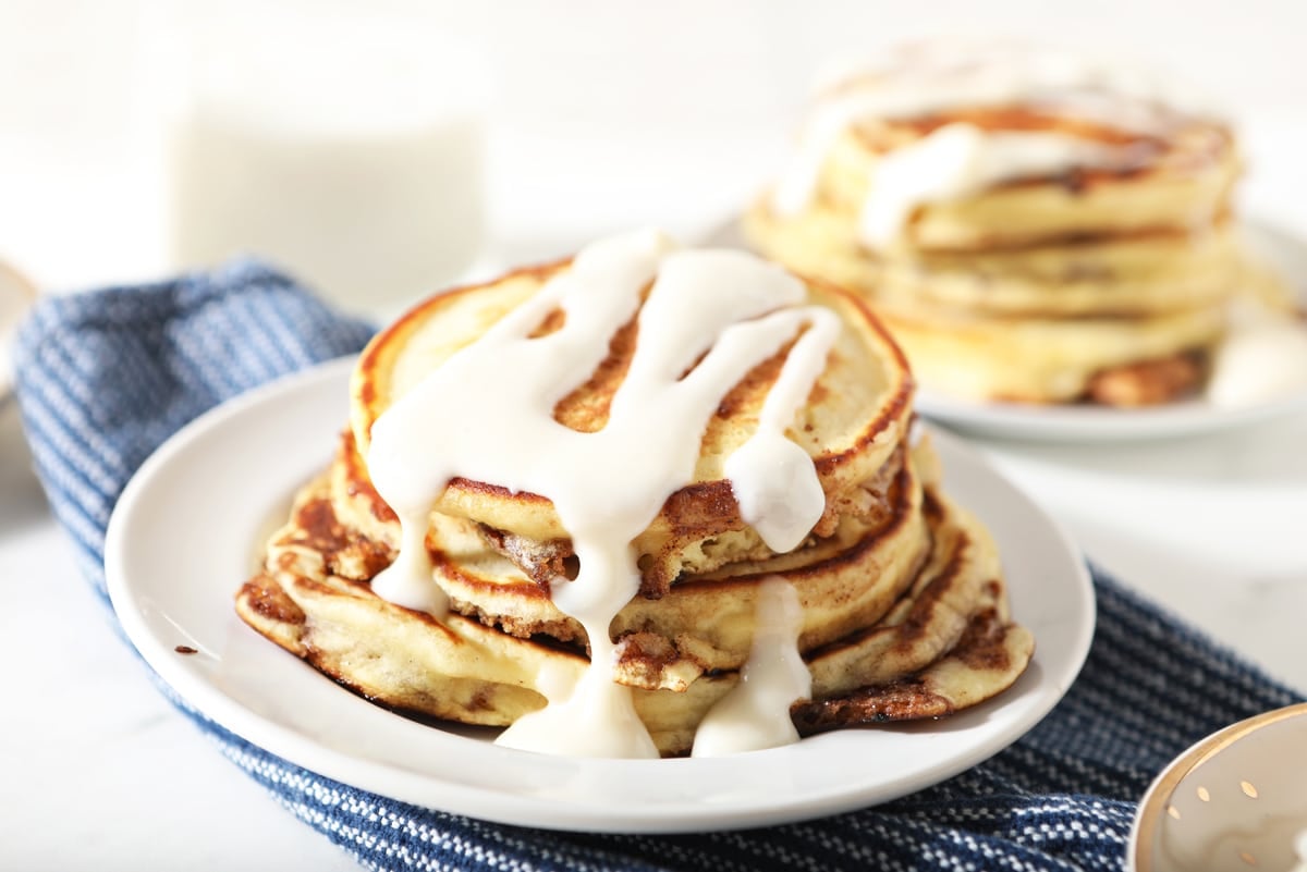 Cinnamon Roll Pancakes with a Sweet Cream Cheese Glaze!