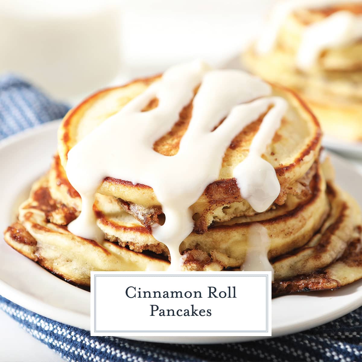 close up stack of cinnamon roll pancakes