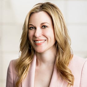 woman wearing pink blazer