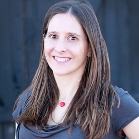 woman with long hair wearing gray shirt