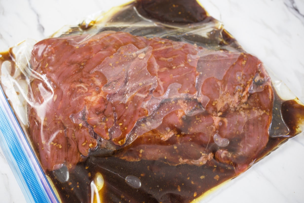 marinating beef in a plastic bag