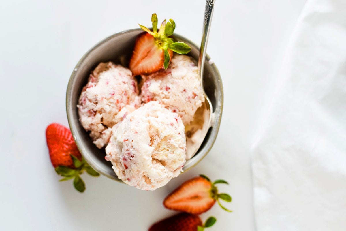 overhead of strawberry ice cream in a bowl 