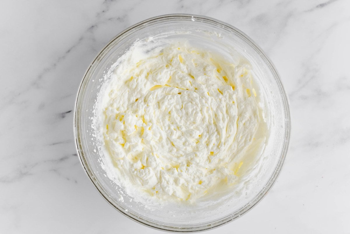 overhead shot of whipped cream in bowl