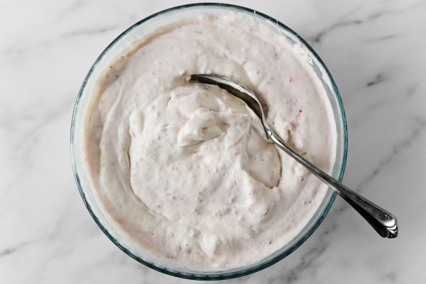 strawberry ice cream base in a mixing bowl