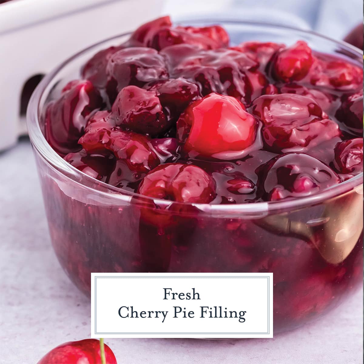 close up of cherry pie filling in a glass bowl