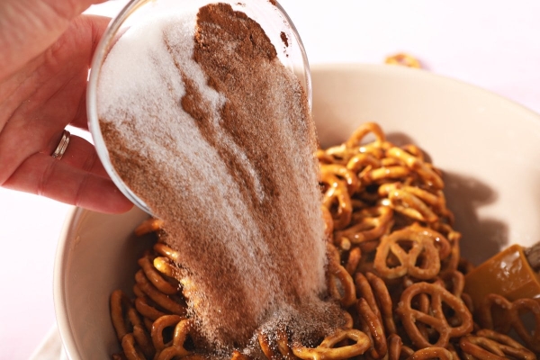 cinnamon sugar over buttered pretzels