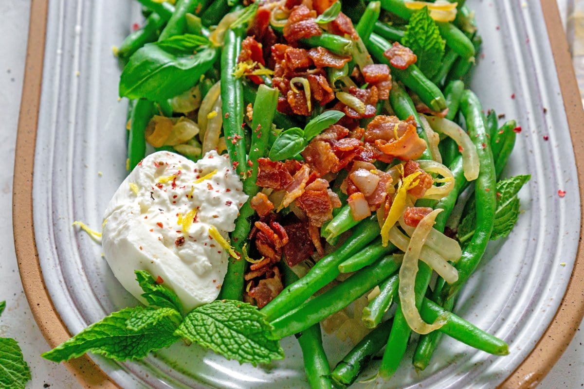 green beans with bacon, burrata and fresh herbs