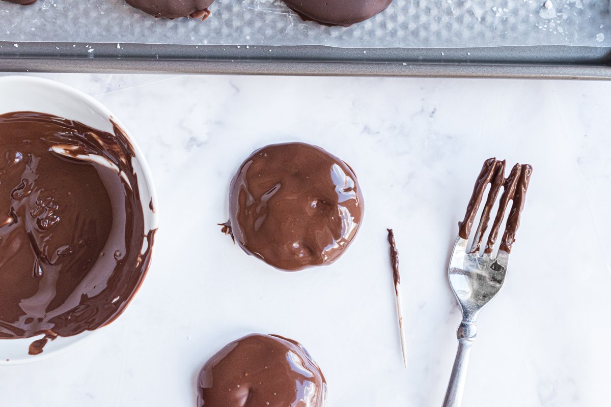 allowing chocolate dipped patties to set 